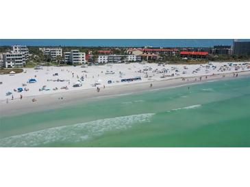 Aerial view of beachfront property with resort-style amenities at 6144 Midnight Pass Rd # 2N, Sarasota, FL 34242