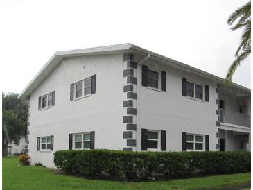 Well-maintained building exterior with landscaping at 305 47Th Avenue W Dr # 143, Bradenton, FL 34207