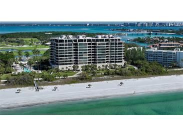 Luxury beachfront condo building with resort-style amenities and stunning ocean views at 415 L Ambiance Dr # C204, Longboat Key, FL 34228