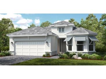 Two-story house with gray roof, white walls, and a two-car garage at 10446 Morning Mist Ln, Sarasota, FL 34241