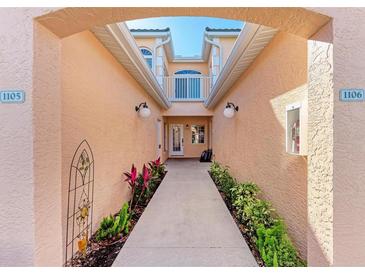 Well-lit entryway with tile flooring and access to unit 1105 and 1106 at 1105 Gondola Park Dr # 1105, Venice, FL 34292