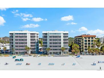 Beautiful beachfront condos with white sand beaches, crystal blue waters and stunning views at 6312 Midnight Pass Rd # 702S, Sarasota, FL 34242