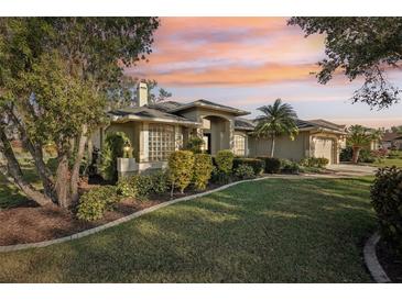 Attractive single-story home with landscaped yard and sunset view at 8818 29Th E St, Parrish, FL 34219