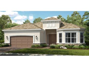 Attractive one-story home with brown garage door and stone accents at 10157 Silent Night Ln, Sarasota, FL 34241