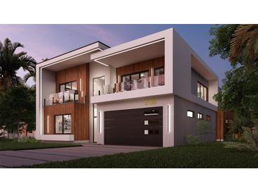 Modern two-story home with wood and white exterior, and a two-car garage at 2135 Hibiscus St, Sarasota, FL 34239