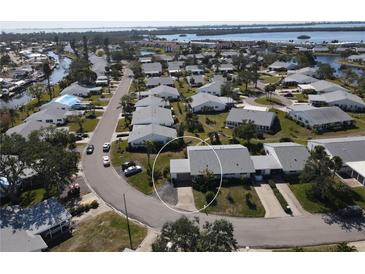 Aerial view of single-story home in a waterfront community at 4424 Mount Vernon Dr, Bradenton, FL 34210