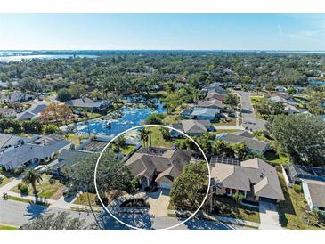 Aerial view of single-Gathering home with pool, situated in a quiet residential neighborhood at 1104 83Rd Nw St, Bradenton, FL 34209