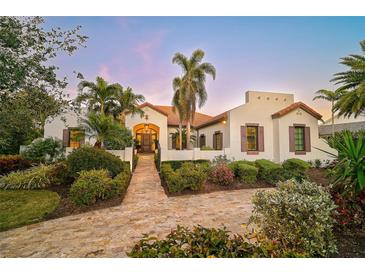 Stunning curb appeal! This home features a beautiful tile walkway leading to the entrance at 230 Osprey Point Dr, Osprey, FL 34229