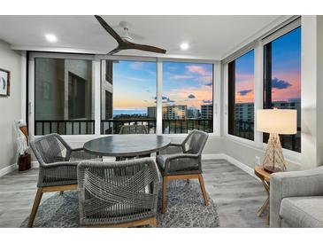 Bright dining area with ocean view and seating for four at 5780 Midnight Pass Rd # 609, Sarasota, FL 34242