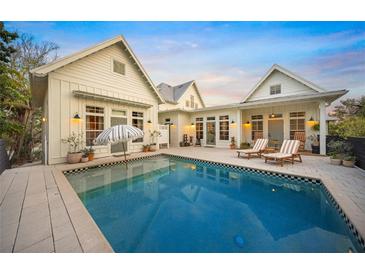 Inviting pool area with lounge chairs, ready for relaxation at 689 Lands End Dr, Longboat Key, FL 34228