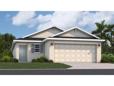 One-story home with gray siding, two-car garage, and landscaping at 9100 Tequila Sunrise Dr, Sarasota, FL 34241