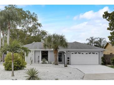 Updated single-story home with a two-car garage and landscaped yard at 3822 75Th E Ter, Sarasota, FL 34243