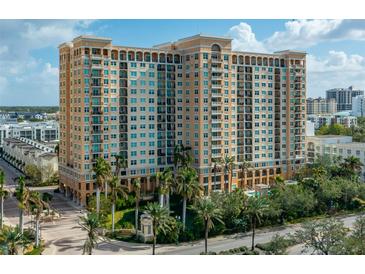 Elegant high-rise building with upscale finishes and landscaping at 750 N Tamiami Trl # 314, Sarasota, FL 34236