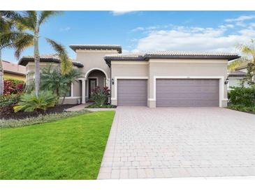 Stunning two-car garage home with lush landscaping at 11101 Sandhill Preserve Dr, Sarasota, FL 34238