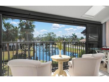 Relaxing balcony overlooking a serene canal view at 6084 Red Maple Rd, Bradenton, FL 34210