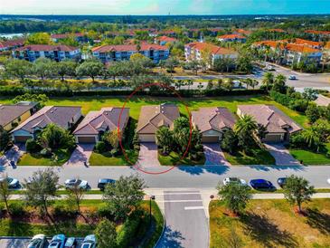 Aerial view of a single-Gathering home in a residential community at 6814 Willowshire Way, Bradenton, FL 34212