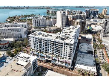 Aerial view of a modern highrise building near the waterfront at 111 S Pineapple Ave # 607, Sarasota, FL 34236