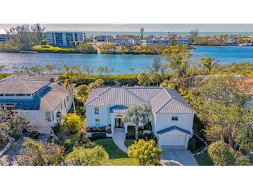 Luxury waterfront home with private dock and stunning canal views at 3371 Bayou Sound, Longboat Key, FL 34228