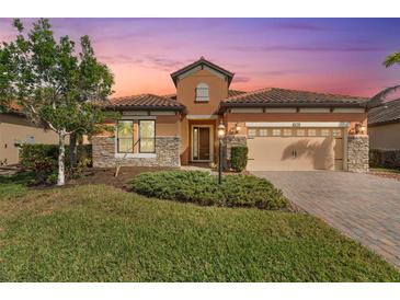 Beautiful single-Gathering home with landscaping at 26720 Weiskopf Dr, Englewood, FL 34223