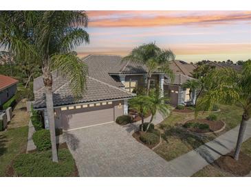 Attractive one-story home with tile roof and landscaped yard at 5112 White Ibis Dr, North Port, FL 34287