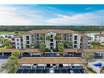 Luxury condo building with parking and golf course views at 16904 Vardon Ter # 405, Bradenton, FL 34211