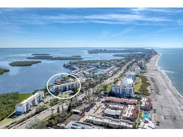 Aerial view of waterfront condo community, highlighting building location and amenities at 4500 Gulf Of Mexico Dr # 305, Longboat Key, FL 34228