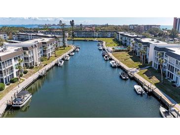 Waterfront property with boat docks and lush landscaping at 4320 Falmouth Dr # 301, Longboat Key, FL 34228