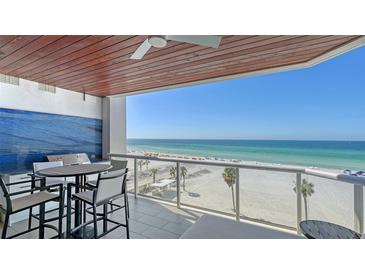 Enjoy breathtaking ocean views from this beautiful balcony with outdoor dining area at 1035 Seaside Dr # 503, Sarasota, FL 34242