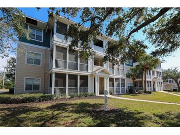 Inviting condo complex featuring screened porches, manicured landscaping, and a welcoming entrance, perfect for relaxed living at 4802 51St W St # 613, Bradenton, FL 34210