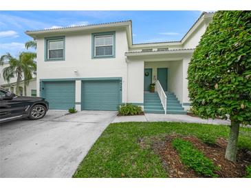 Charming two-story home with a well-manicured lawn and a two-car garage in a suburban neighborhood at 6524 Fairway Gardens Dr # 6524, Bradenton, FL 34203