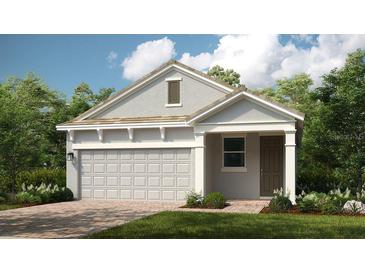 Charming single-Gathering home with a two-car garage and well-maintained lawn at 26930 Lark Ct, Punta Gorda, FL 33955