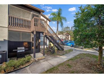 Inviting condominium exterior featuring well-maintained landscaping, a private balcony, and convenient parking at 3863 59Th W Ave # 4189, Bradenton, FL 34210