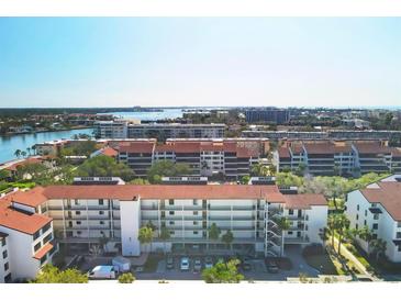 Beautiful condo building with stunning water views and access to nearby beaches at 6285 Midnight Pass Rd # 101, Sarasota, FL 34242