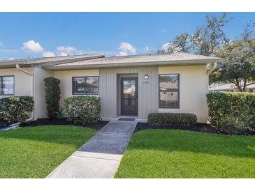 Charming single-story home featuring well-maintained landscaping and a welcoming front entrance at 2720 60Th Avenue W Dr # D, Bradenton, FL 34207