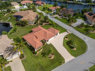 Aerial view showcasing a single-Gathering home's location and landscaping at 442 Macedonia Dr, Punta Gorda, FL 33950