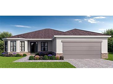 One-story home with a brown roof, attached garage, and landscaped front yard at 218 Soursop, Punta Gorda, FL 33955