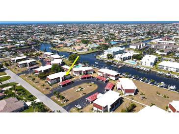 Aerial view of waterfront community, highlighting unit location and parking at 311 Garvin St # 309D, Punta Gorda, FL 33950