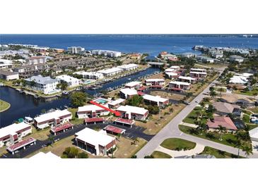 Aerial view of waterfront community, highlighting property location and nearby amenities at 311 Garvin St # 401A, Punta Gorda, FL 33950