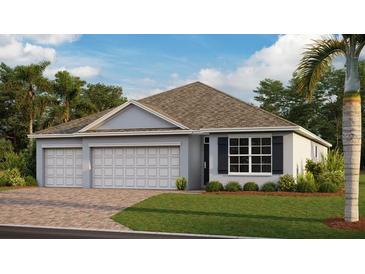 Two-story home with a three-car garage and attractive landscaping at 1496 Mableton Dr, Port Charlotte, FL 33953