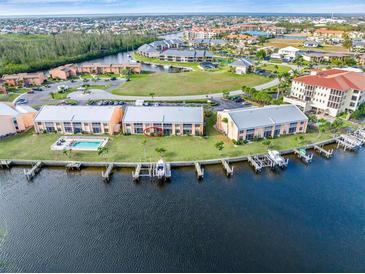 Aerial view of waterfront community, highlighting a condo unit at 1348 Rock Dove Ct # C103, Punta Gorda, FL 33950