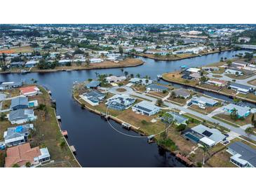 Property is on a canal with great water access at 6365 Scorpio Ave, North Port, FL 34287