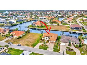 Luxury waterfront home with private dock and expansive canal views at 5221 Almar Dr, Punta Gorda, FL 33950