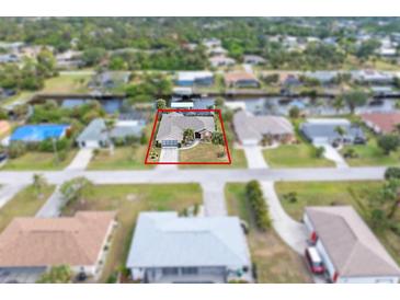 Birds-eye view of single-Gathering home and neighborhood at 18305 Wolbrette Cir, Port Charlotte, FL 33948