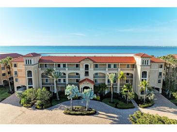 Luxury waterfront condo building with ocean views and resort-style amenities at 87 Vivante Blvd # 403, Punta Gorda, FL 33950