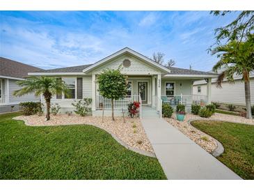 Charming one-story home with landscaped lawn and walkway at 526 Allen St, Punta Gorda, FL 33950