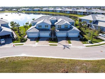 Luxury townhouses with lake views in a gated community at 14138 Poppy Field Loop # 4122, Punta Gorda, FL 33955