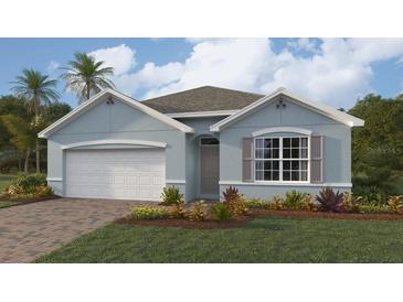 Single-story home with light blue exterior, white garage door, and landscaping at 1422 Powell Valley Dr, Port Charlotte, FL 33953