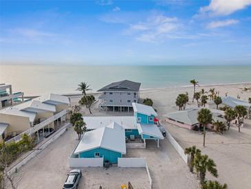 Beachfront home with private beach access, spacious backyard, and ocean views at 2726 N Beach Rd, Englewood, FL 34223