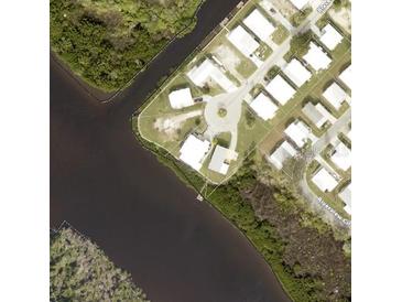 Aerial view of a waterfront community in an idyllic riverside location at 735 Blackburn Blvd, North Port, FL 34287