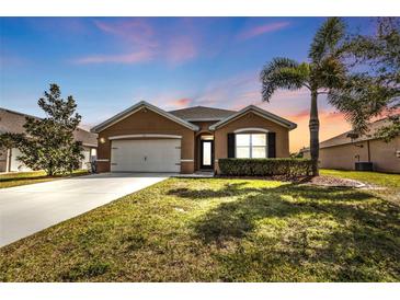 Charming single Gathering home with a well maintained yard and beautiful palm tree at 7325 Mikasa Dr, Punta Gorda, FL 33950